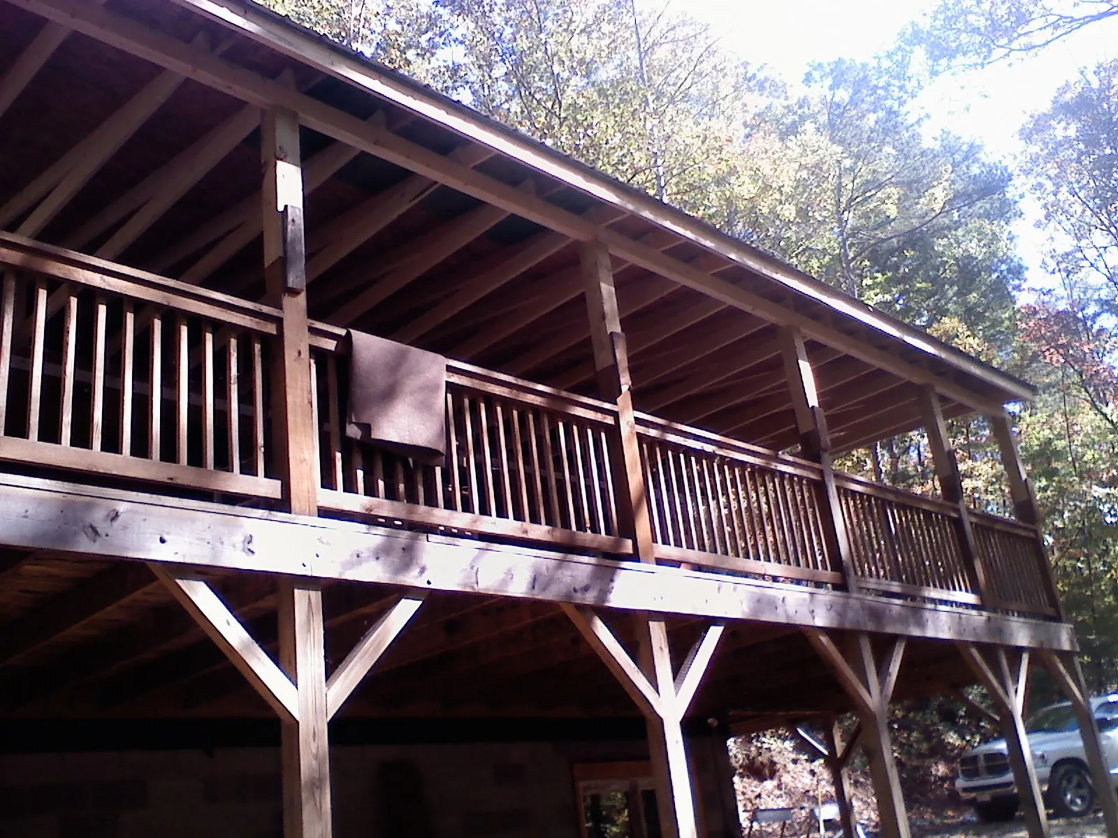 Timber framing under a new elevated porch and deck — Roof Leak Repair in Monument by Roofing Brothers